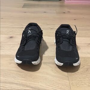On Running Black Sneakers with White Accents